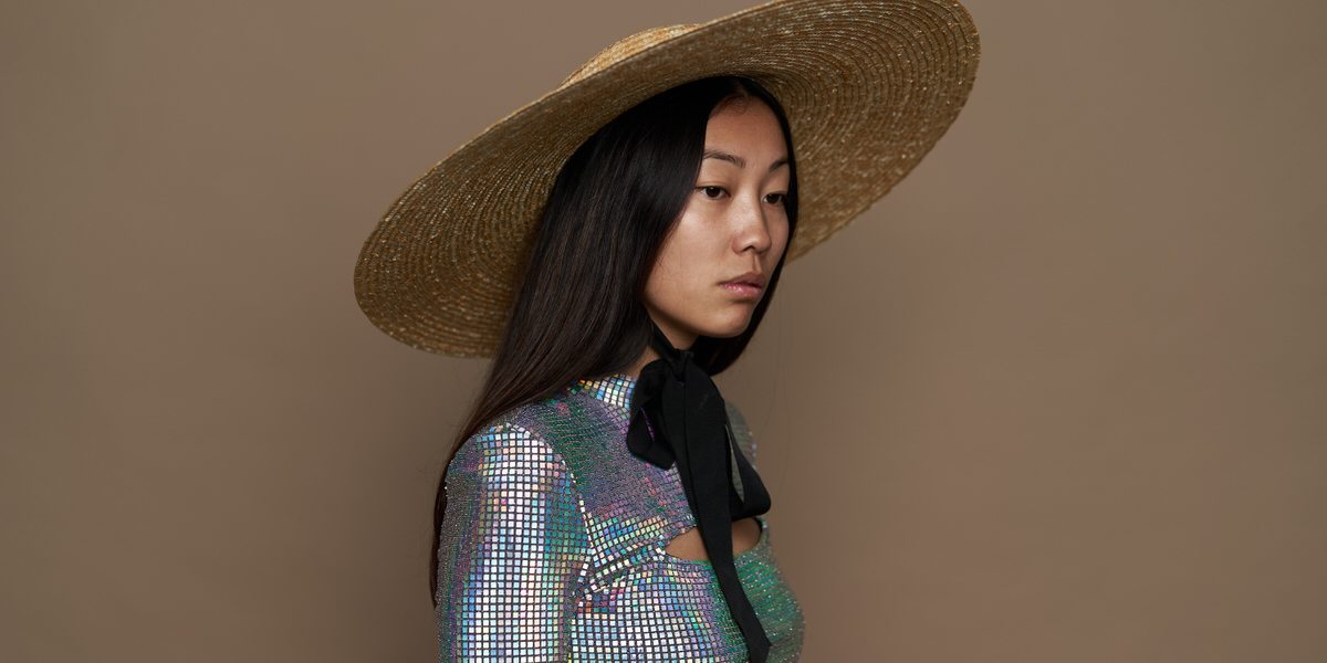 Asian model in trendy outfit