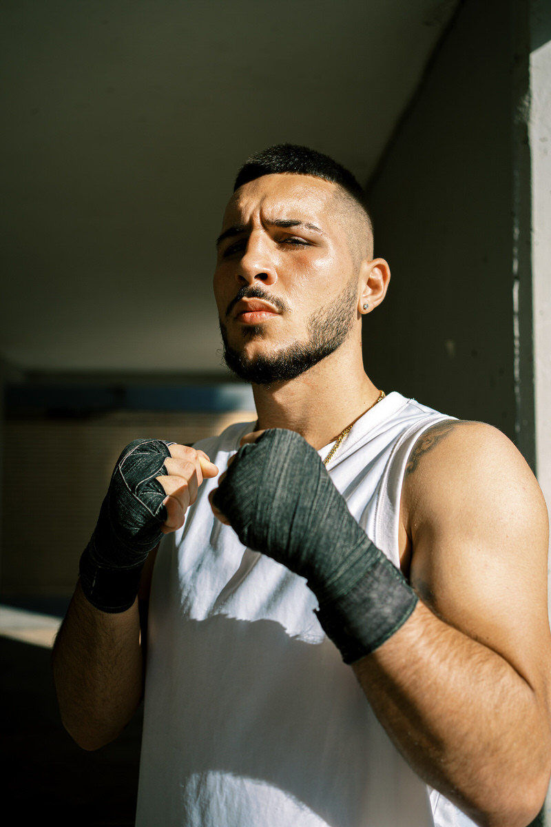 Sportsman with boxing wraps on hands