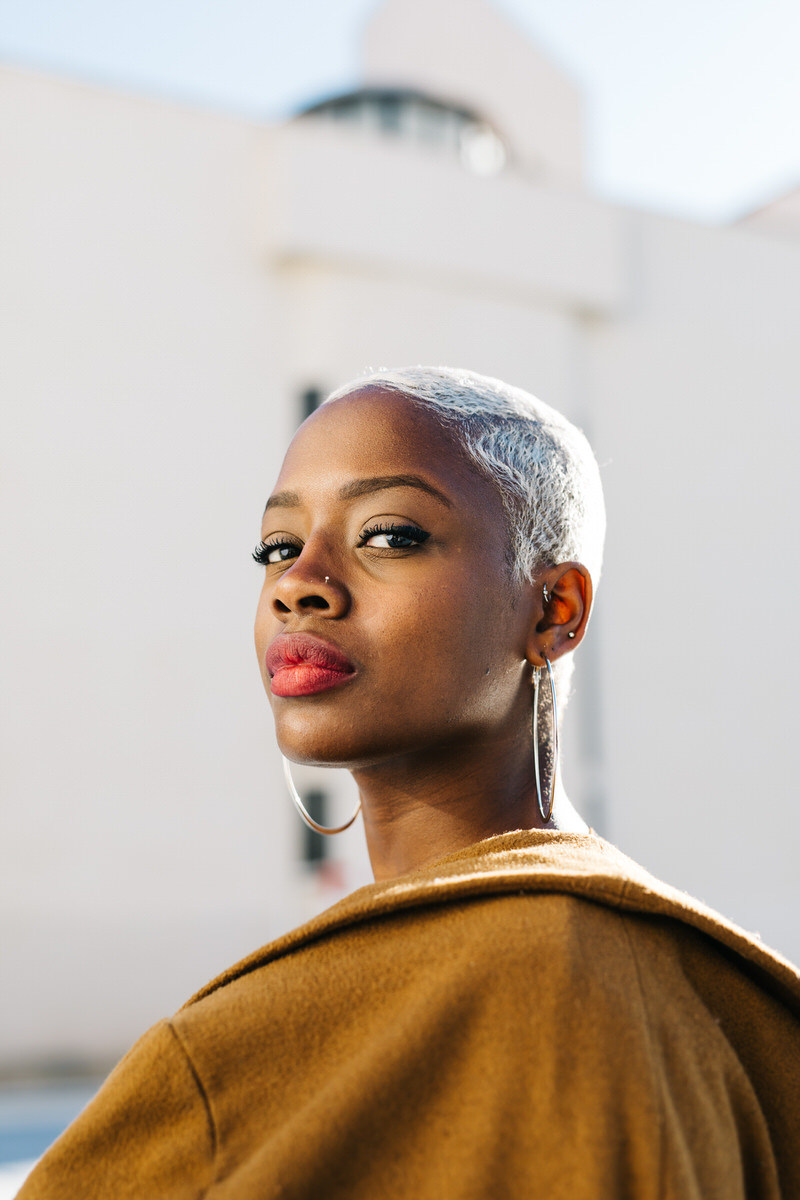 Gorgeous black woman looking at camera