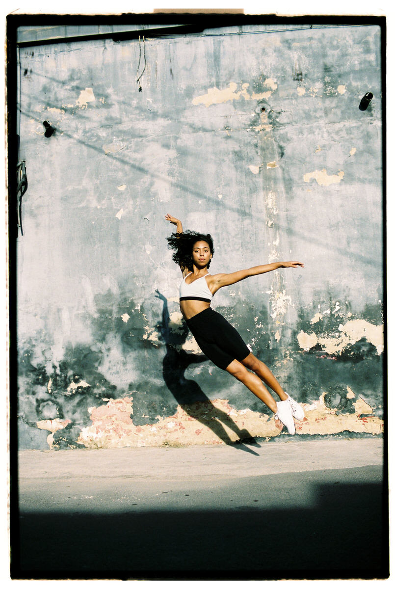 Fit woman dancing on street