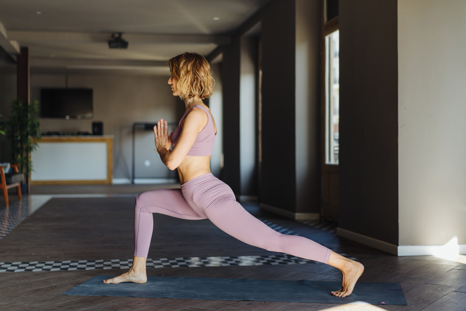 Woman performing Extended Side Plank