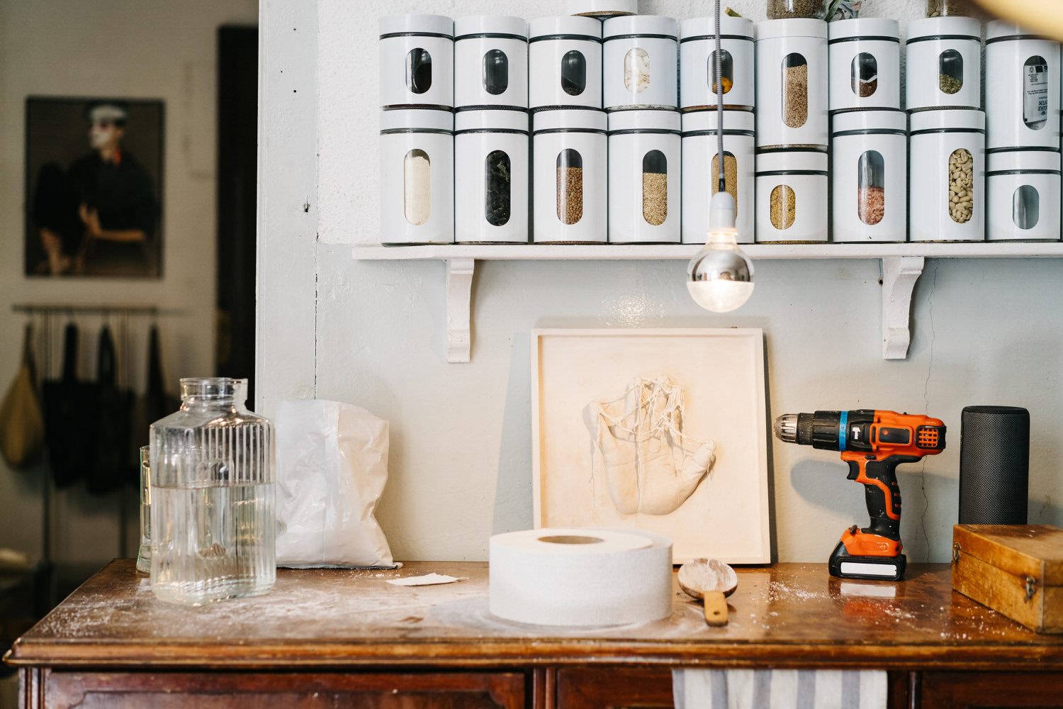 Drill and water jar in workshop