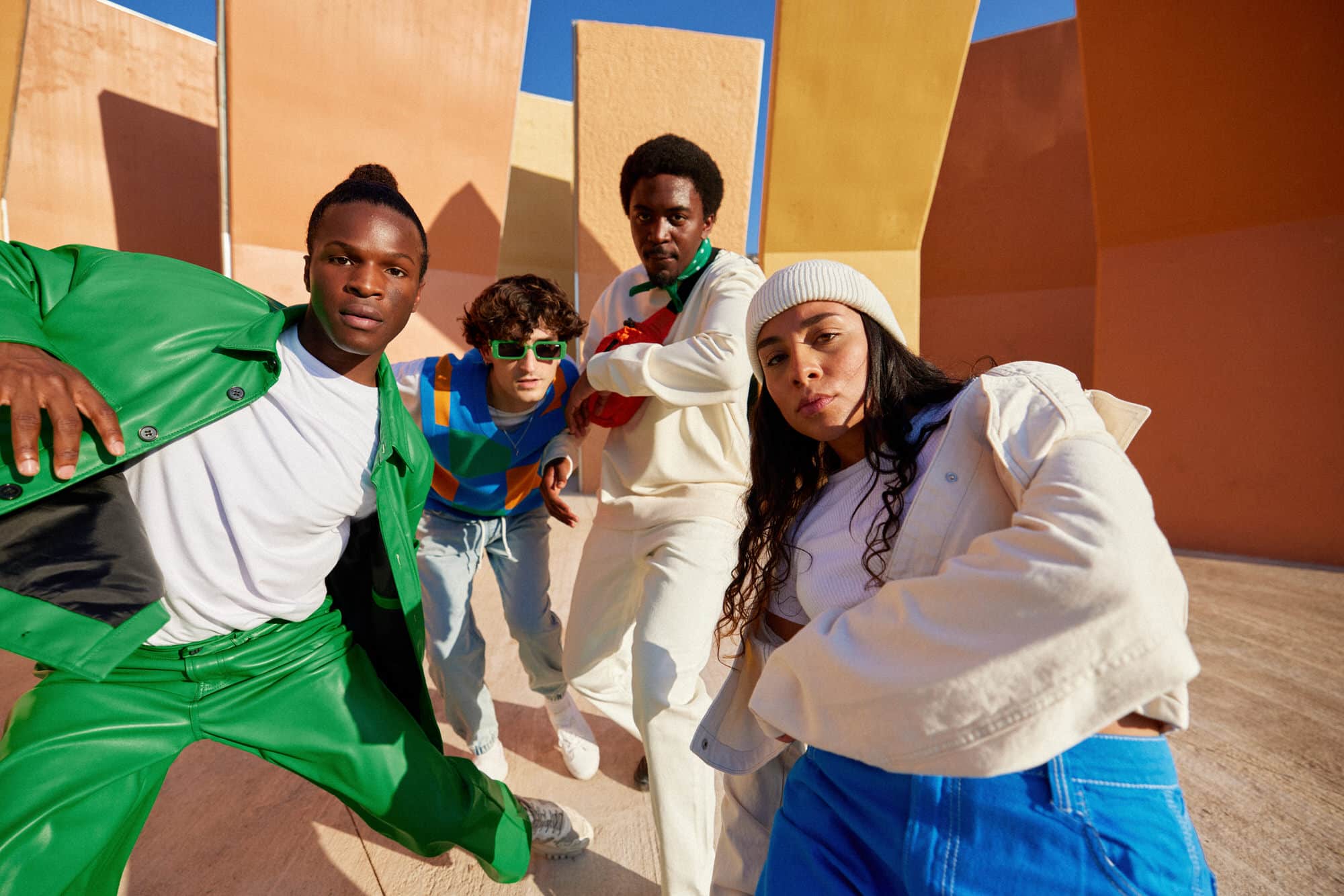 Multiracial young dancers performing in park